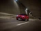 Roter Alfa Romeo in einem Tunnel, frontal.