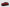 Roter Fiat in seitlicher Frontalansicht vor grauem Hintergrund.