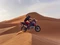 Honda Africa Twin Motorrad in einer Wüstenlandschaft.