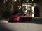 Frontansicht eines geparkten Mazda in elegantem Rot.