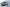 Bronzefarbener Opel SUV geparkt in Seitenansicht.