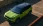 Grüner Jeep Compass mit Panoramadach von oben