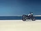 Honda NX500 Motorrad am Meer geparkt.