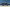 Geparktes Honda NX500 Motorrad mit Blick aufs Meer.
