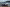 Geparkter Honda SUV mit Seepanorama im Hintergrund.